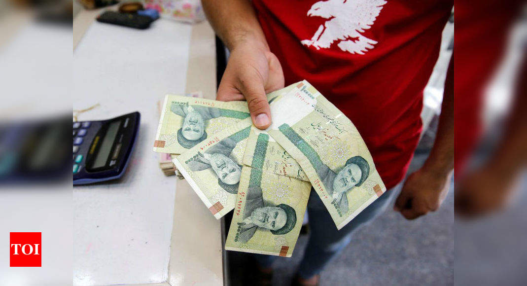 Iran’s currency sees a new record low amid biting sanctions