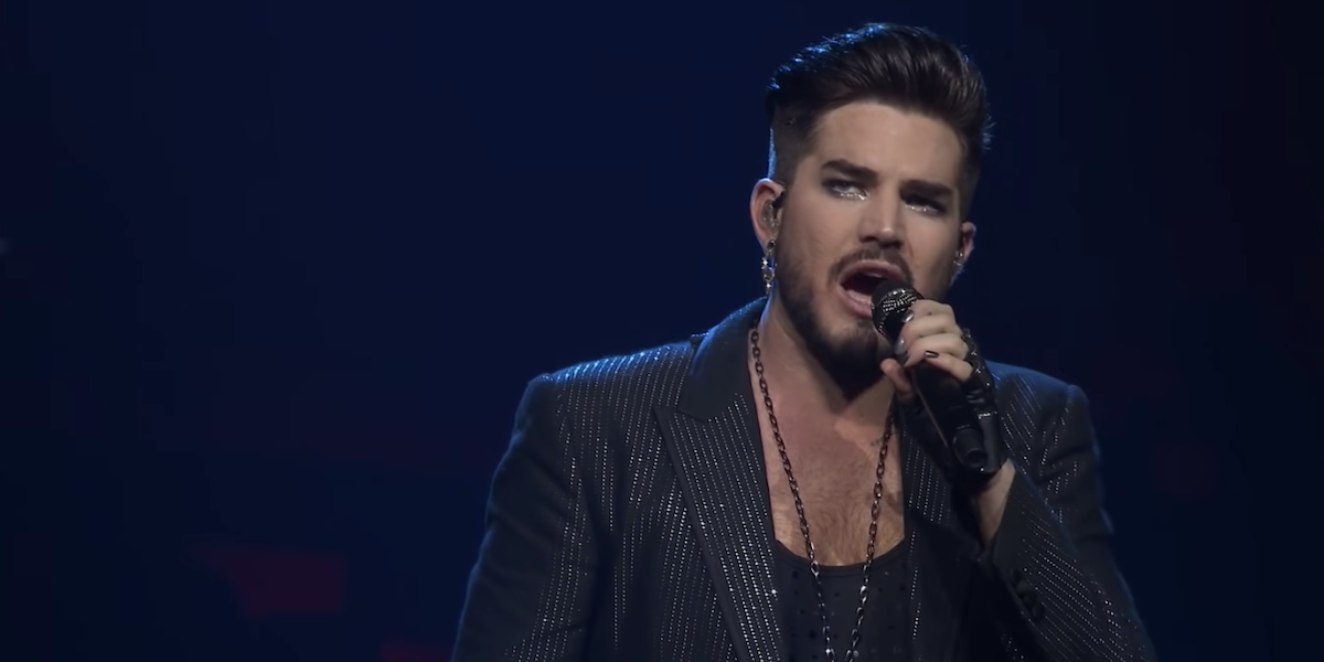 Queen’s Adam Lambert Talks Why Not Being Able To Tour This Summer May Have Been A Blessing For Brian May